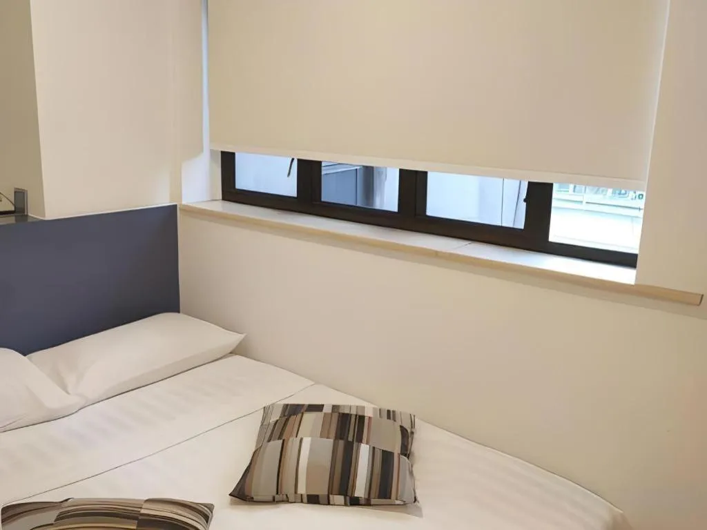 Bed in Goodrich Hotel