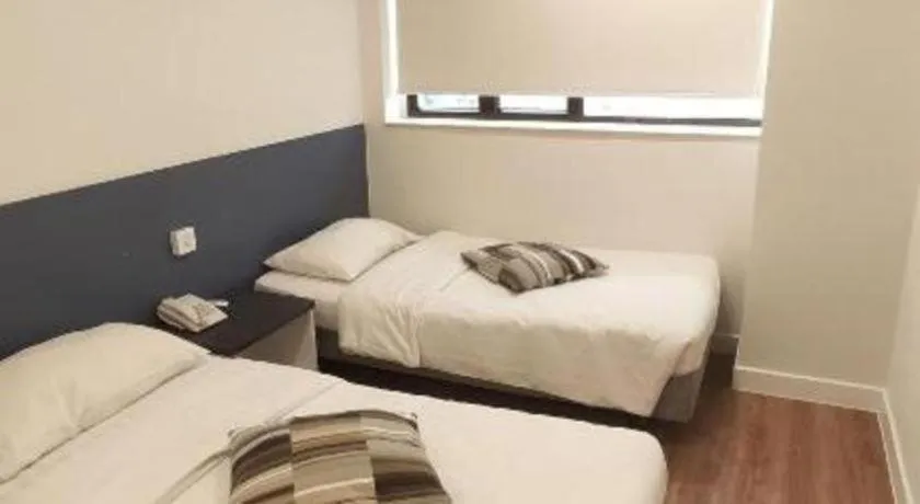 Bed in Goodrich Hotel