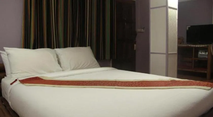 Bed in I Am Chiang Rai Resort