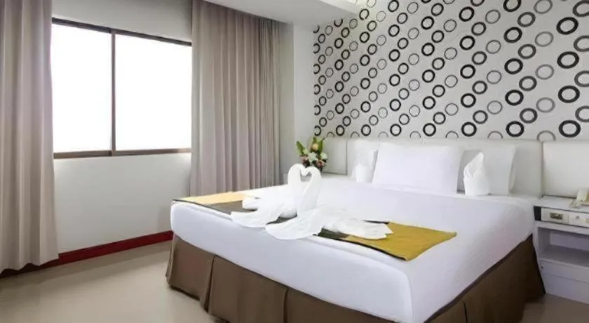 Bed in Hatyai Rama Hotel