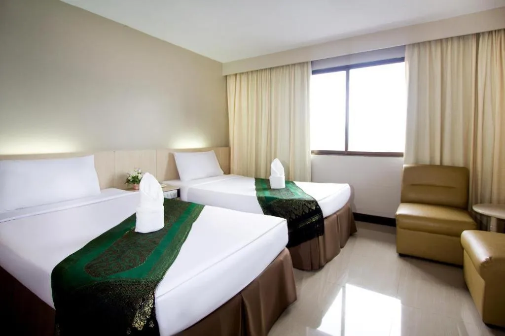 Bed in Hatyai Rama Hotel