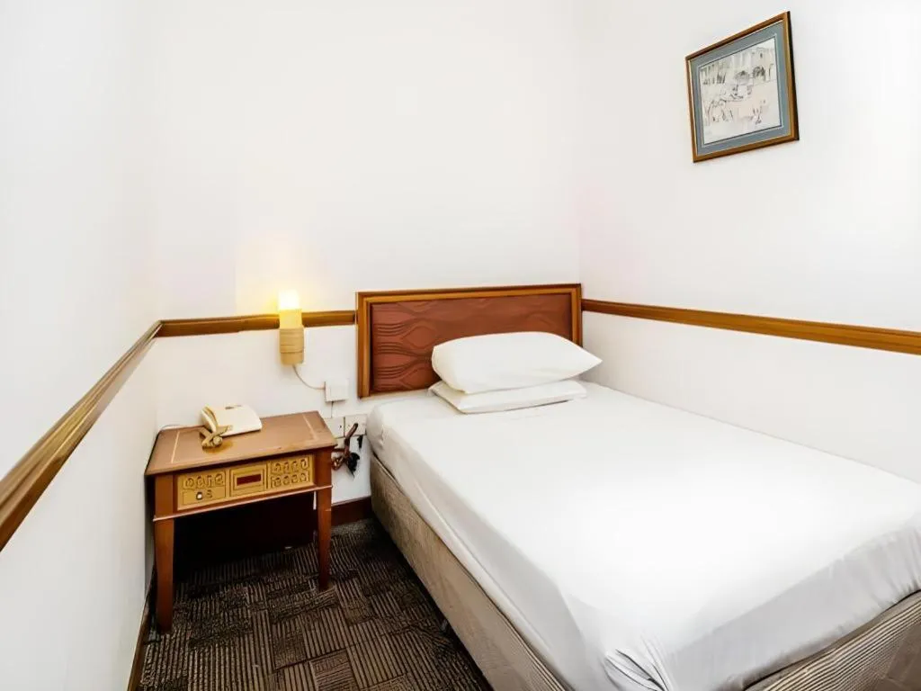 Bed in Four Chain View Hotel