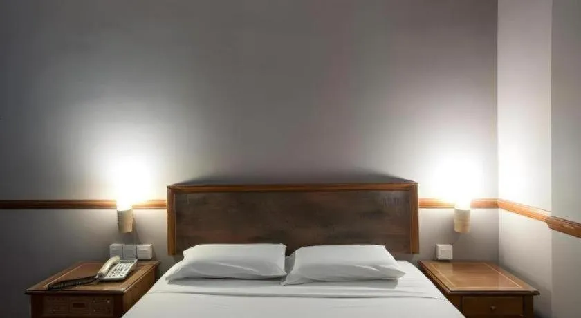 Bed in Four Chain View Hotel