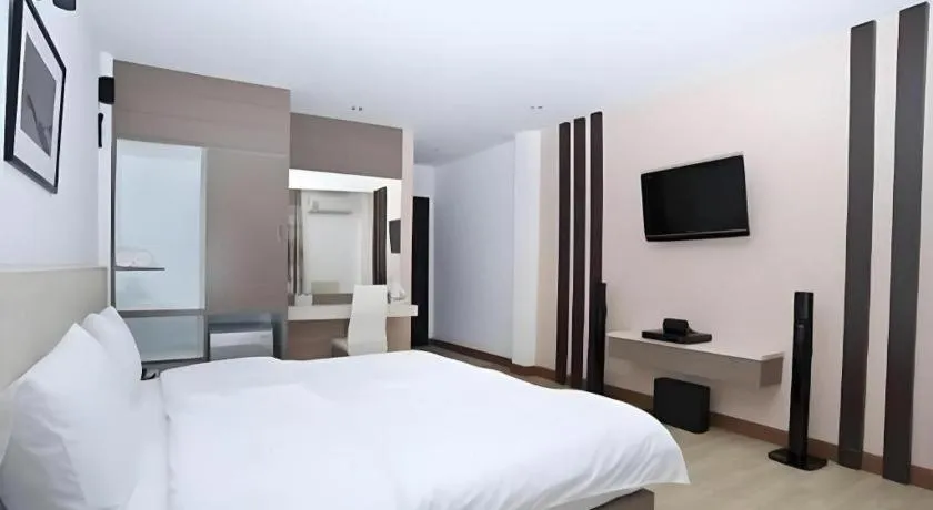 Bed in Siamgrand Hotel