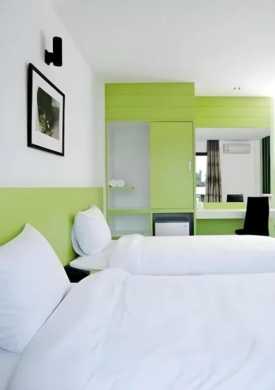 Bed in Siamgrand Hotel