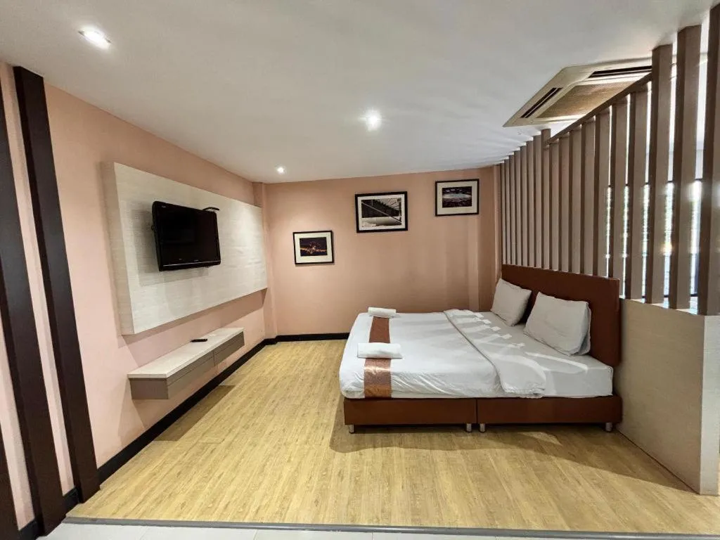 Bed in Siamgrand Hotel