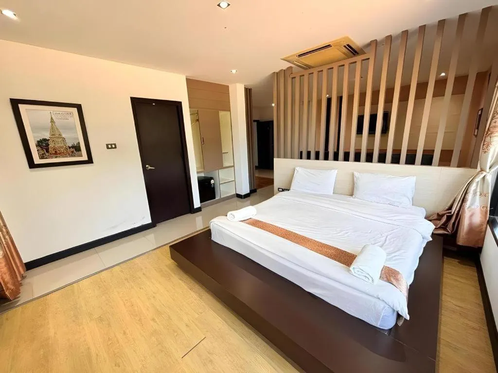 Bed in Siamgrand Hotel