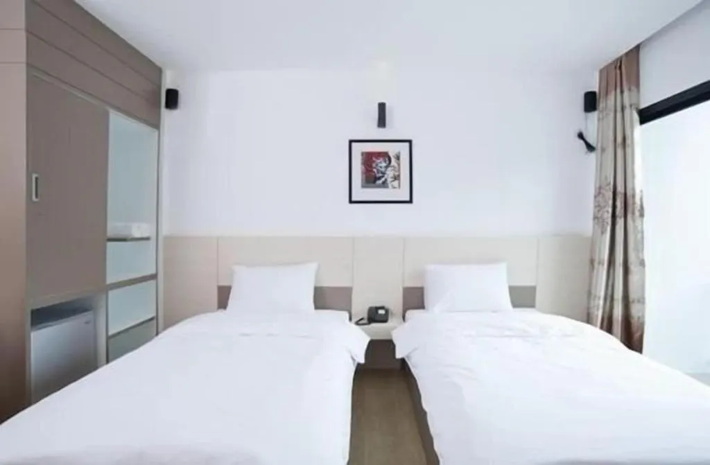 Bed in Siamgrand Hotel