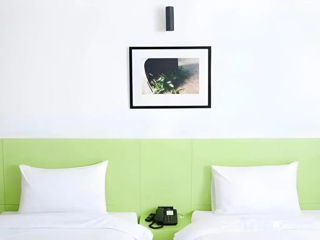 Bed in Siamgrand Hotel