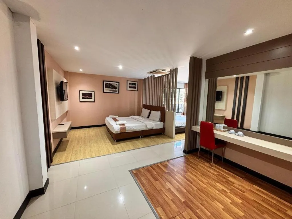 Bed in Siamgrand Hotel