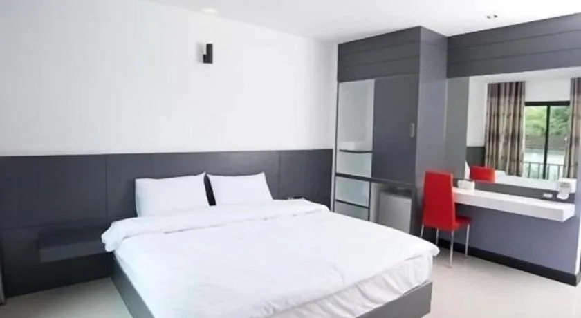 Bed in Siamgrand Hotel