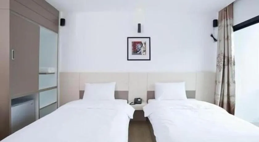 Bed in Siamgrand Hotel