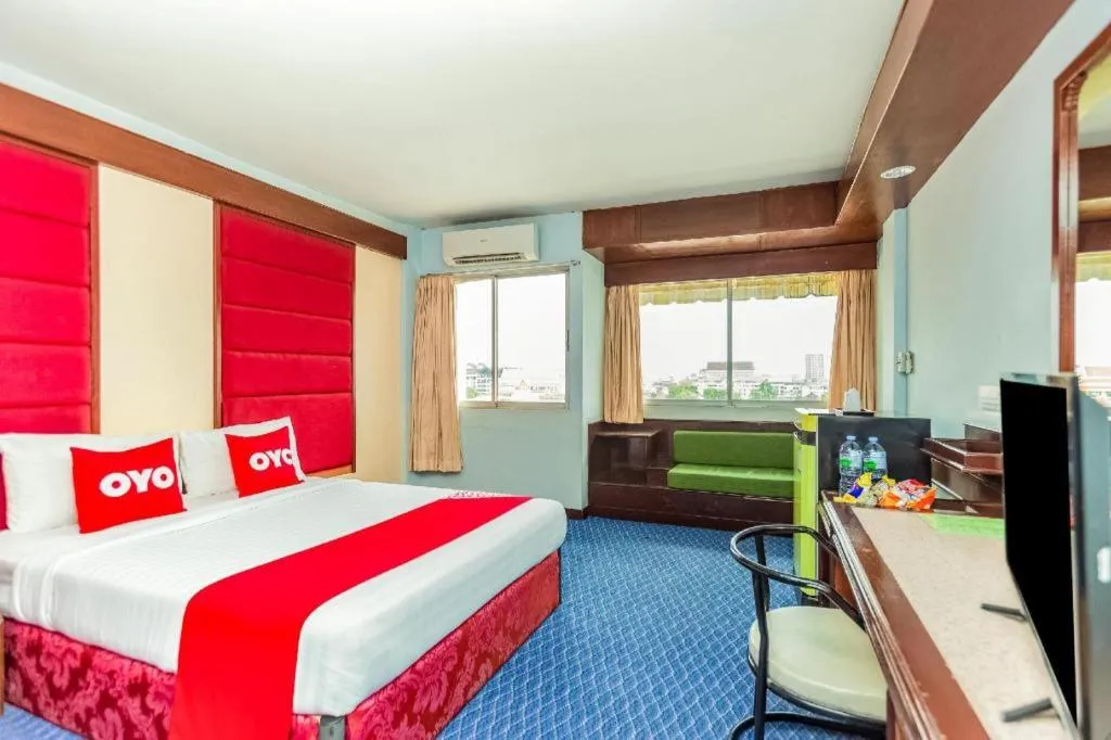 Bed in OYO 441 Grand Thara Hotel