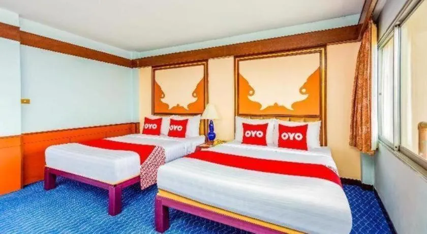 Bed in OYO 441 Grand Thara Hotel