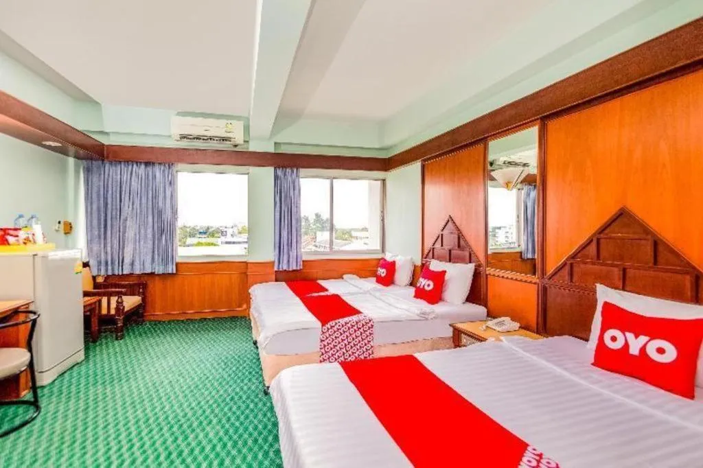 Bed in OYO 441 Grand Thara Hotel