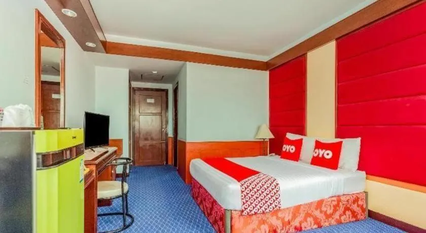 Bed in OYO 441 Grand Thara Hotel