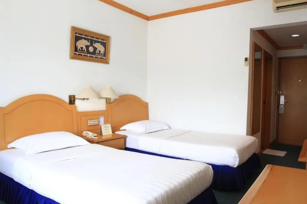 Bed in Hotel Marcopolo