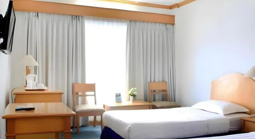 Bed in Hotel Marcopolo