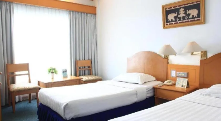 Bed in Hotel Marcopolo