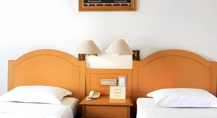 Bed in Hotel Marcopolo