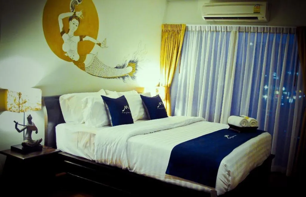 Bed in Maytara Hotel