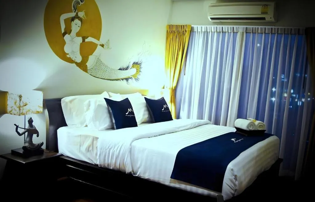 Bed in Maytara Hotel