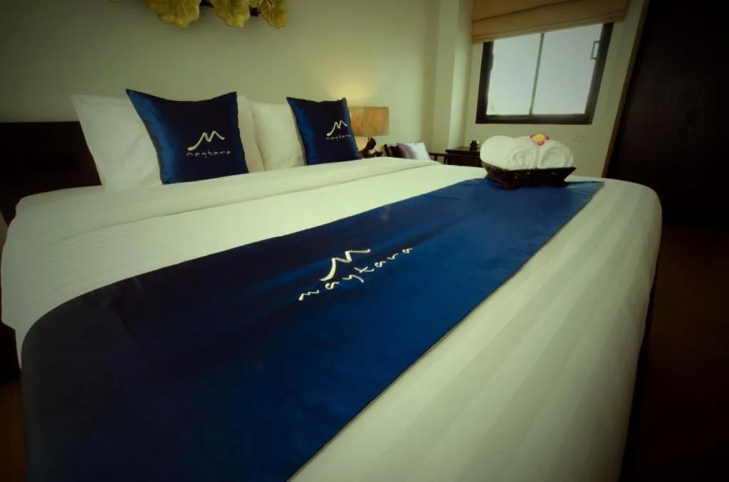 Bed in Maytara Hotel