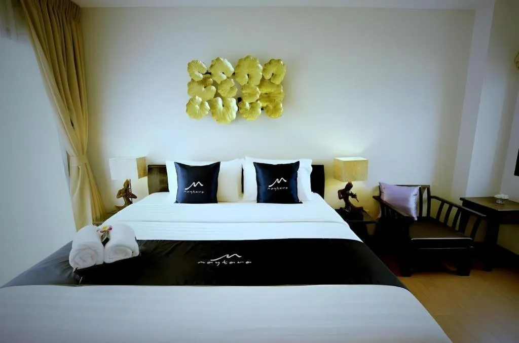 Bed in Maytara Hotel