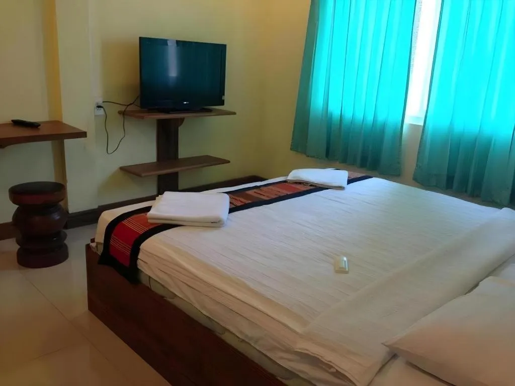 Bed in Lankham Hotel