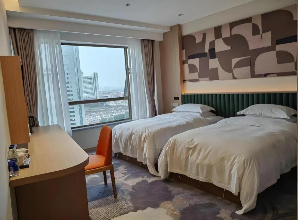 Bed in Zhangjiagang Guomao Hotel
