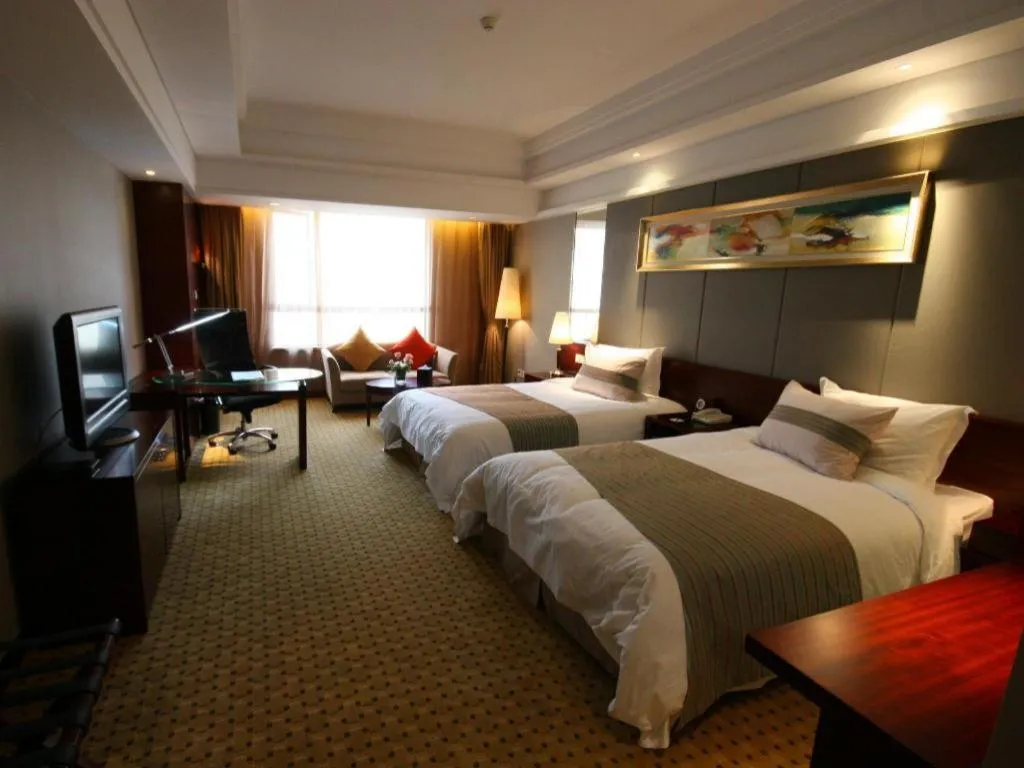 Bed in Zhangjiagang Guomao Hotel