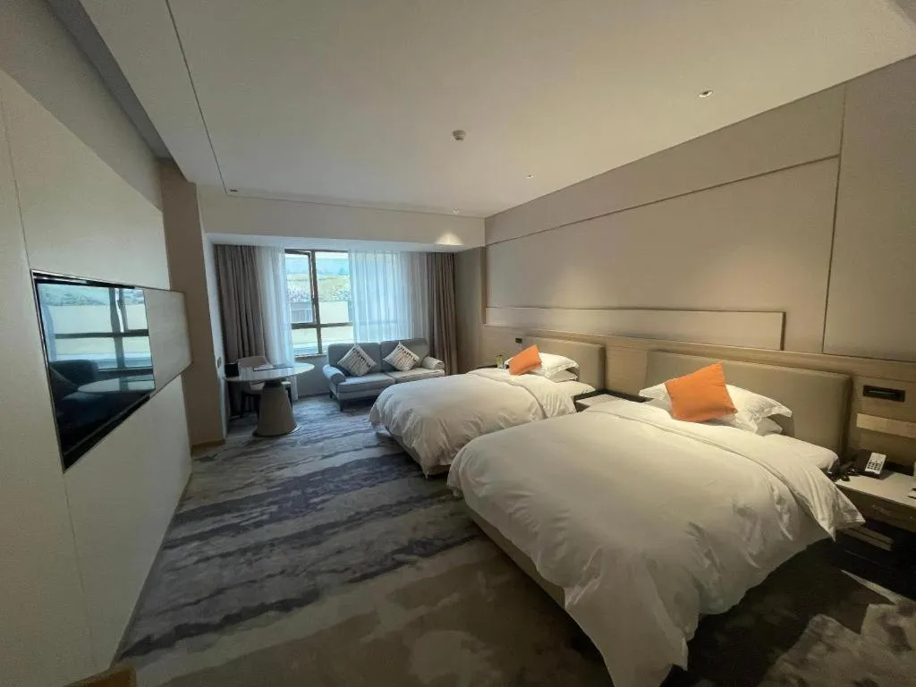 Bed in Zhangjiagang Guomao Hotel