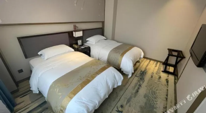 Bed in Zhangjiagang Guomao Hotel