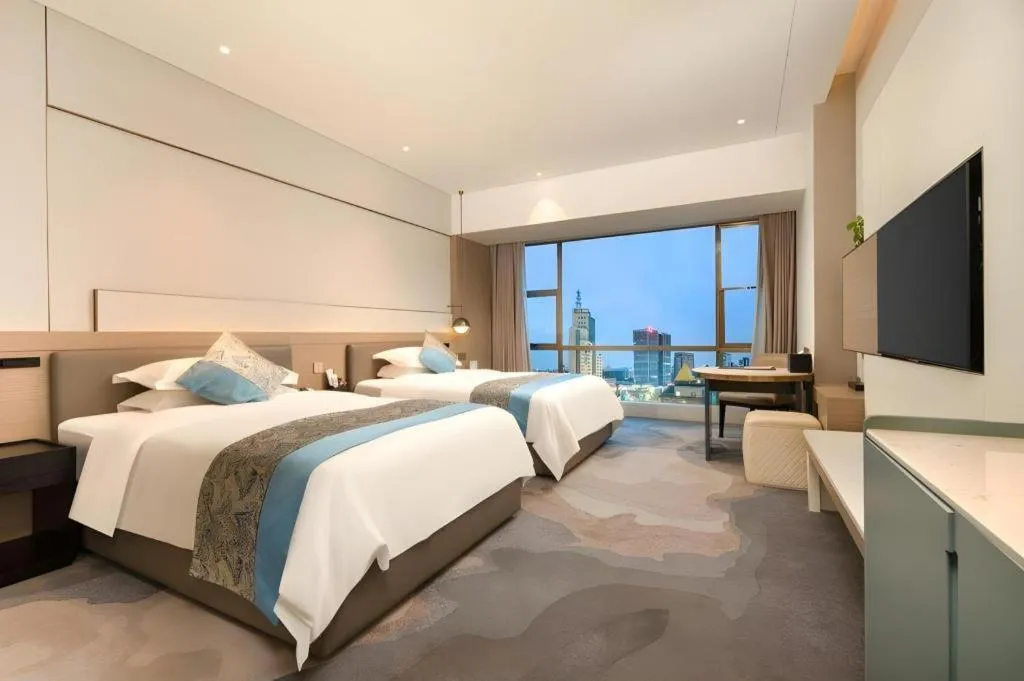 Bed in Zhangjiagang Guomao Hotel