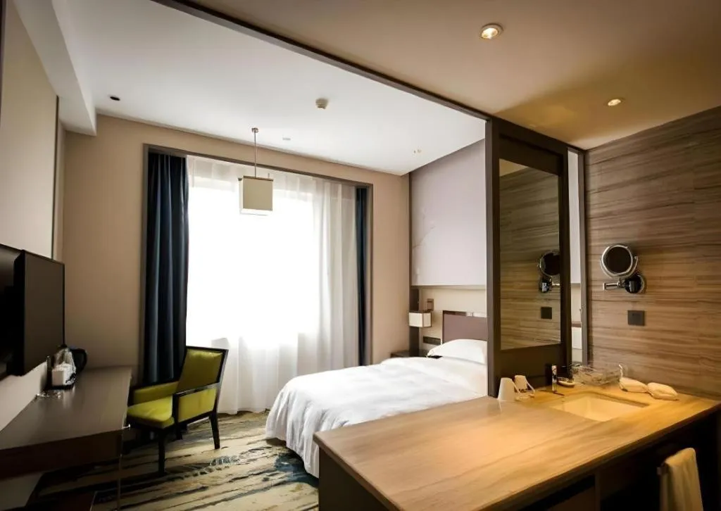 Bed in Zhangjiagang Guomao Hotel