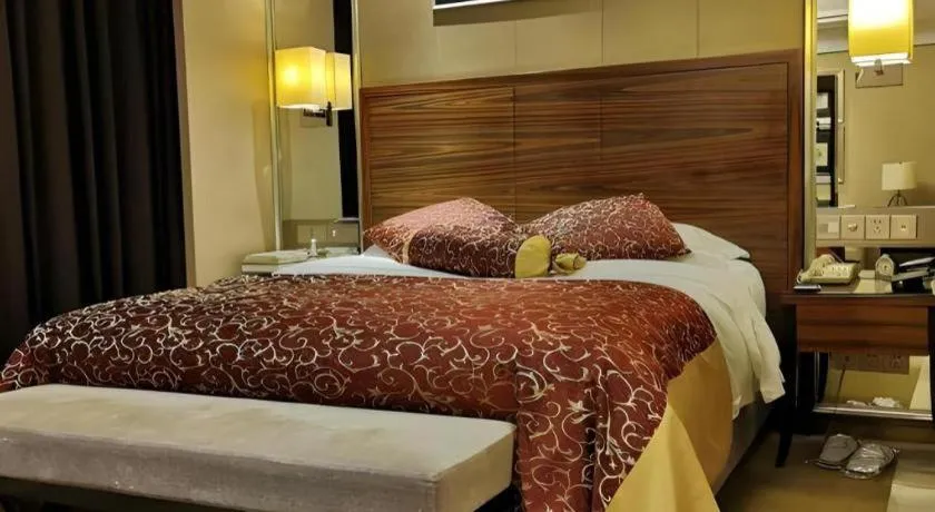 Bed in Zhangjiagang Guomao Hotel