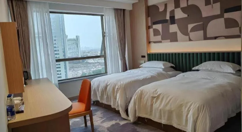 Bed in Zhangjiagang Guomao Hotel