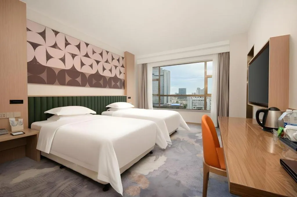 Bed in Zhangjiagang Guomao Hotel