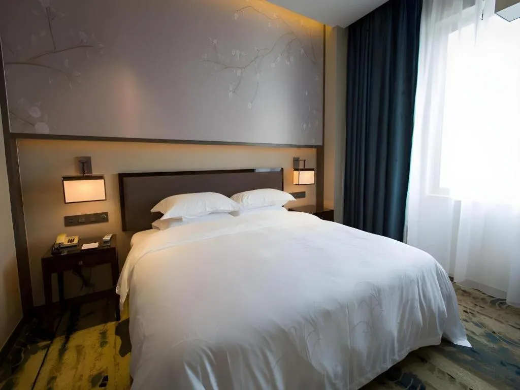Bed in Zhangjiagang Guomao Hotel