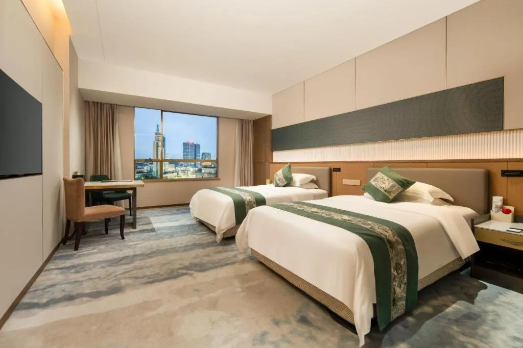 Bed in Zhangjiagang Guomao Hotel