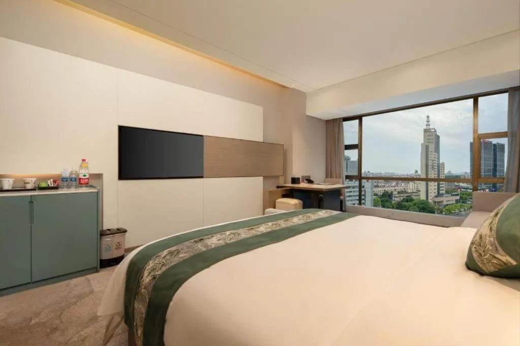 Bed in Zhangjiagang Guomao Hotel