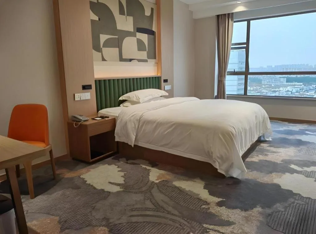 Bed in Zhangjiagang Guomao Hotel