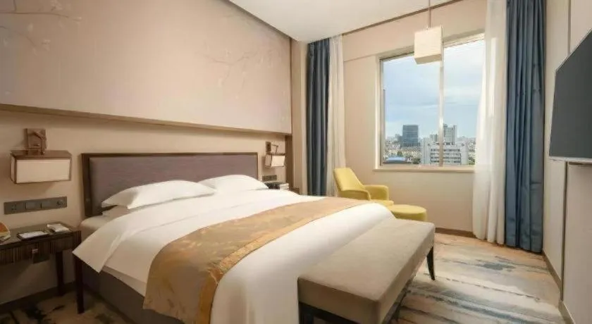 Bed in Zhangjiagang Guomao Hotel