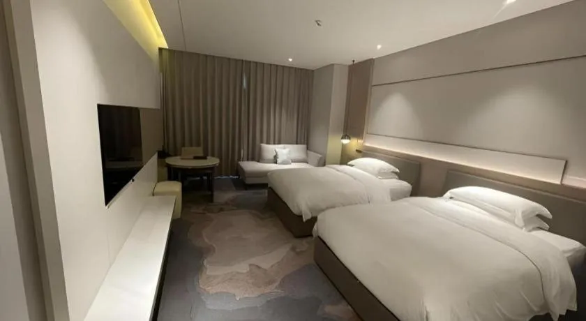 Bed in Zhangjiagang Guomao Hotel