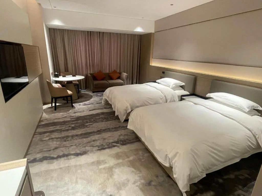 Bed in Zhangjiagang Guomao Hotel