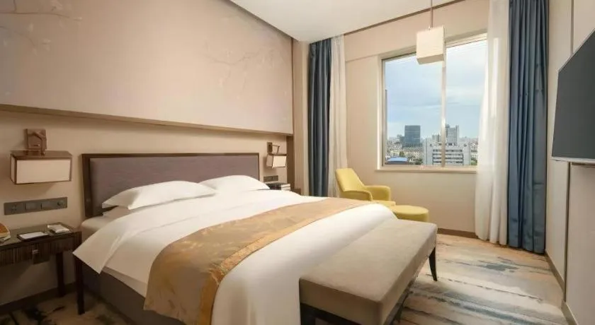 Bed in Zhangjiagang Guomao Hotel