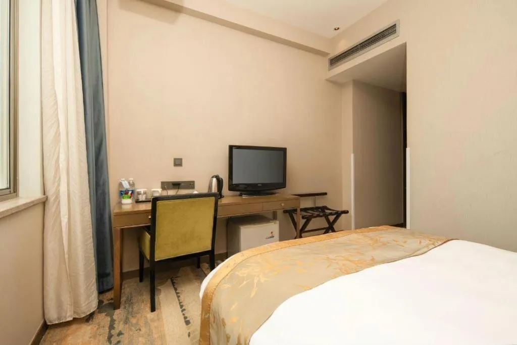 Bed in Zhangjiagang Guomao Hotel