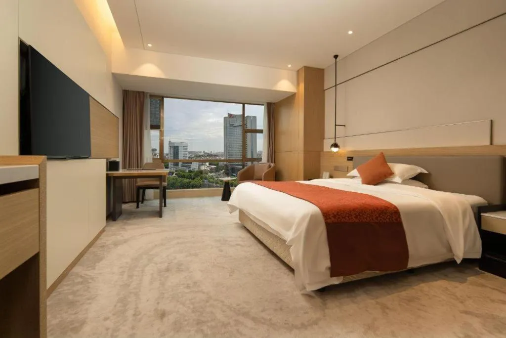 Bed in Zhangjiagang Guomao Hotel