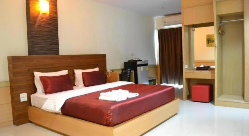 Bed in Amnauysuk Hotel