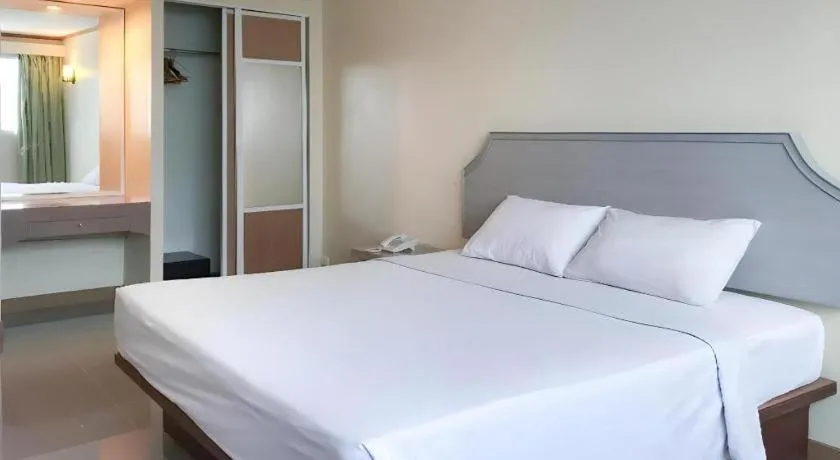 Bed in J Two S Pratunam Hotel